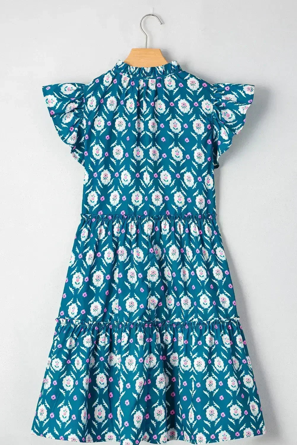 Robe bleue à imprimé floral rétro, col fendu et manches courtes à volants