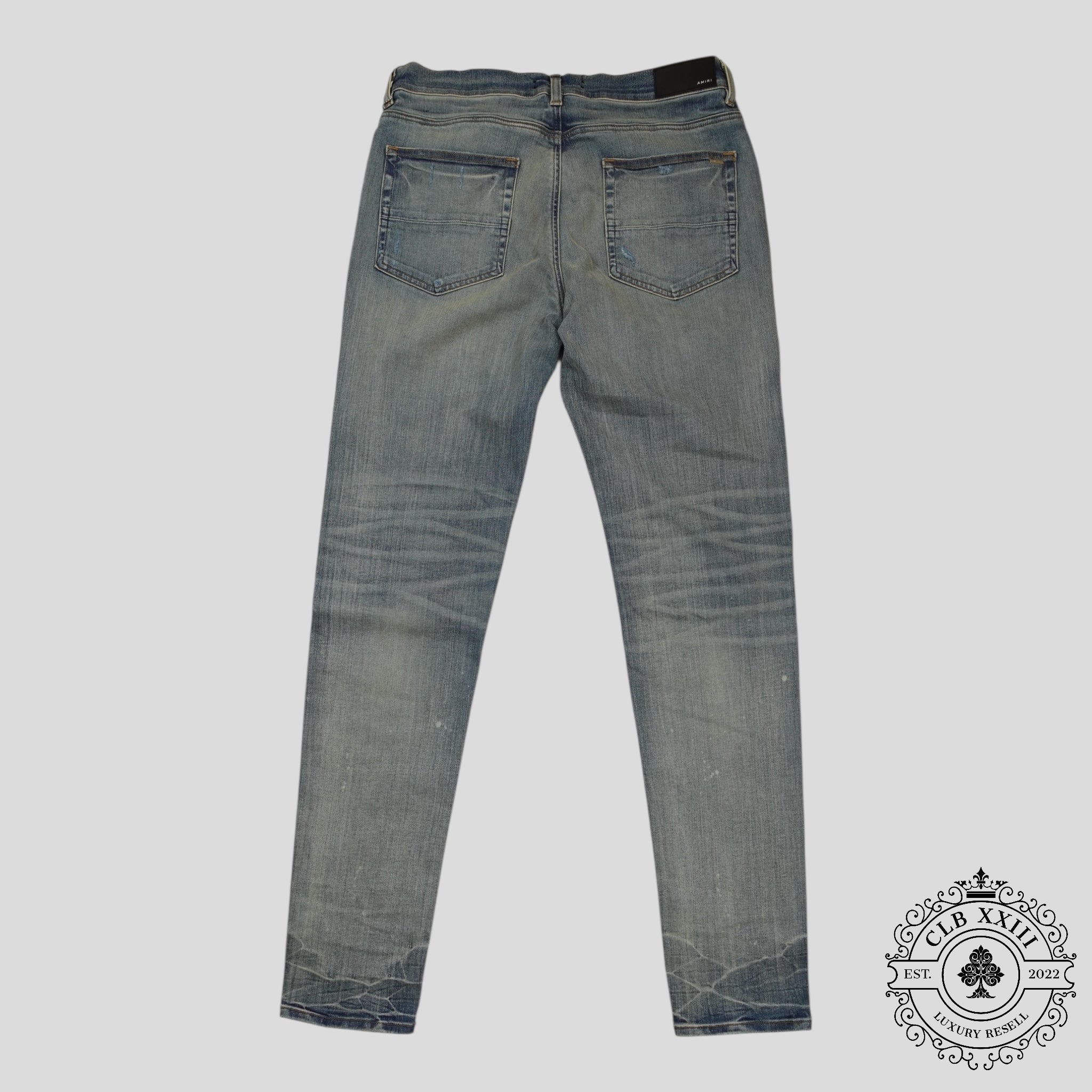 Jeans Amiri MX1 Camo Patch en indigo argileux