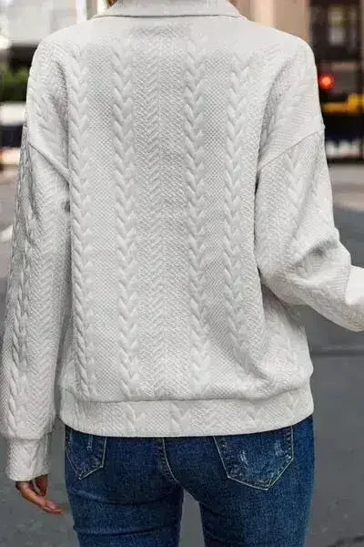 Sweat-shirt à manches longues et quart de zip texturé