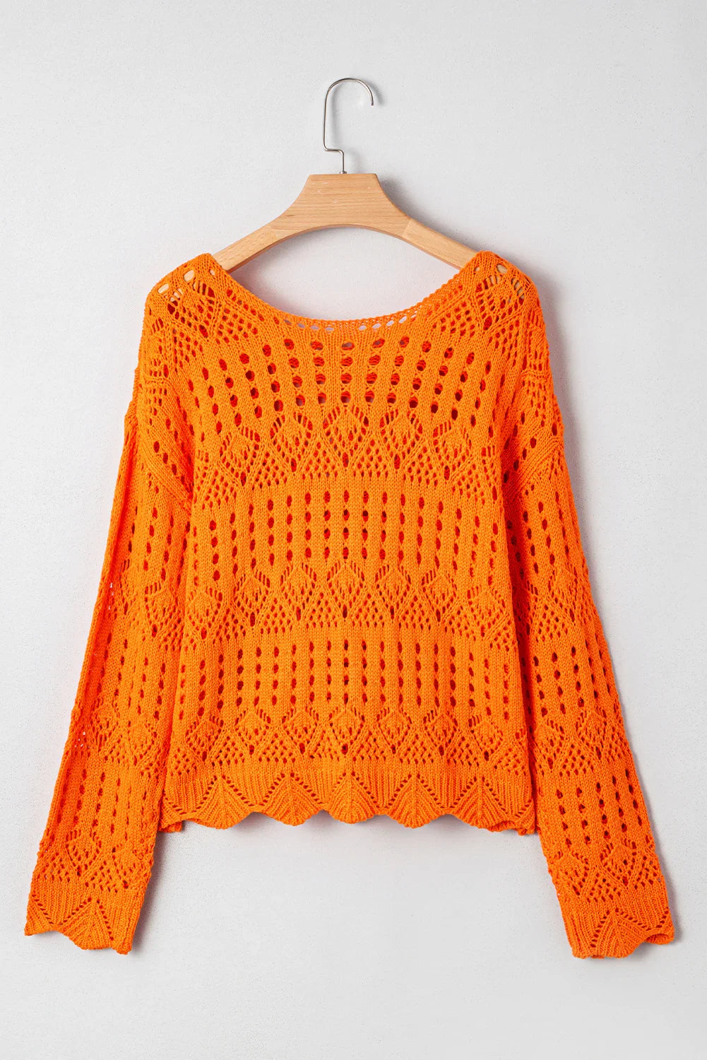 Pull au crochet uni couleur carotte avec bord festonné