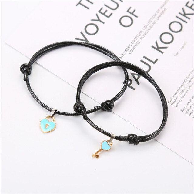 1 paire de bracelets pour couple en alliage, breloque clé et cadenas cœur, bracelet en corde tressée à la main, ensemble de bracelets pendentifs clé et cadenas, bracelet réglable en corde tressée noire avec cadenas et clé cœur pour femme