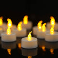 Paquet de 100 : Bougie chauffe-plat LED ambre jaune sans flamme à lumière fixe