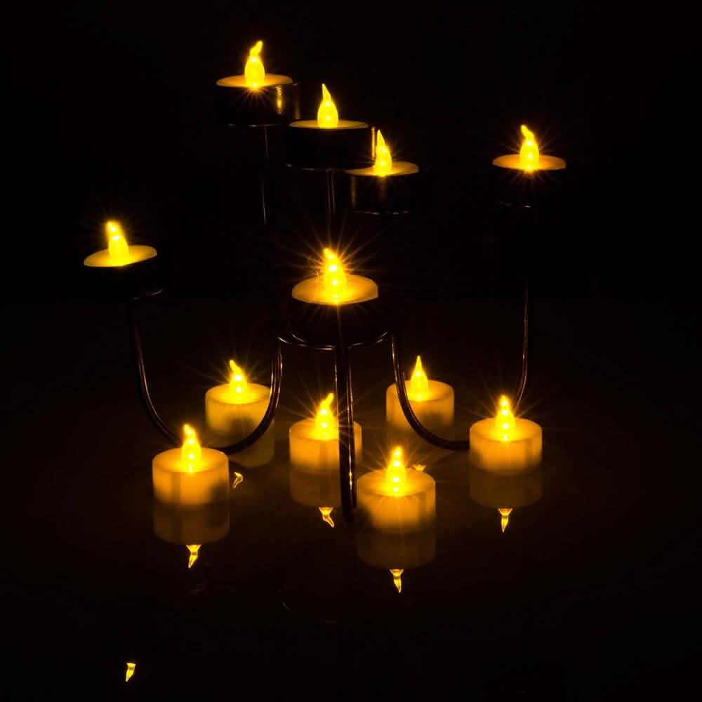 Paquet de 100 : Bougie chauffe-plat LED ambre jaune sans flamme à lumière fixe