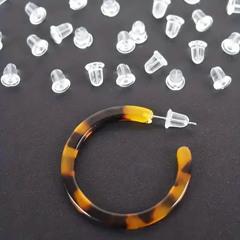 100 Pièces : Attaches / Bouchons d'oreille en plastique transparent pour boucles d'oreilles