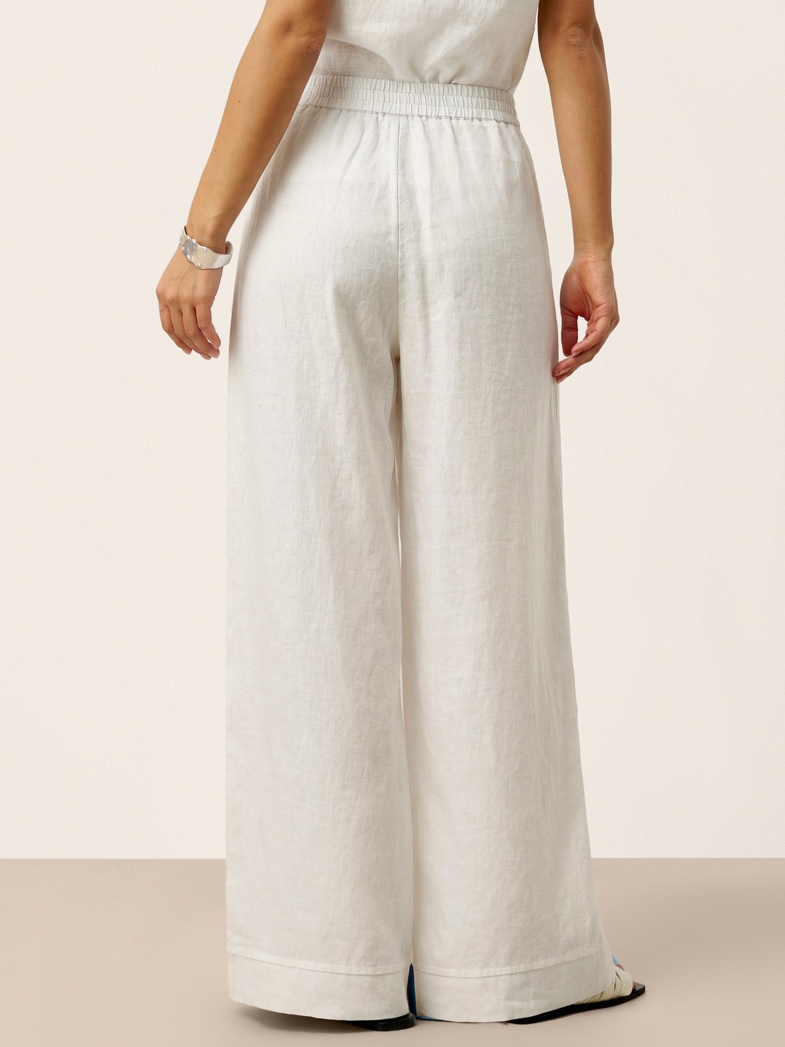 Pantalon VERIDIANA en 100 % lin, plissé sculpté et dos élastiqué, coupe décontractée