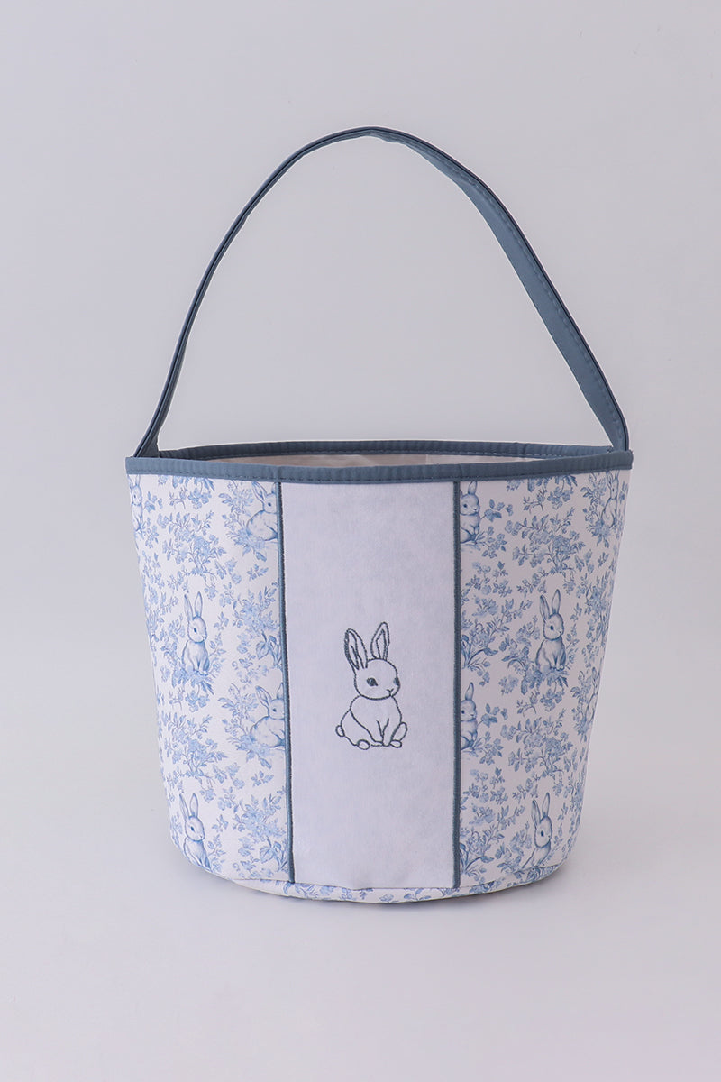 Panier fleuri petit lapin bleu