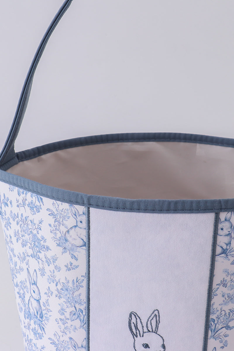 Panier fleuri petit lapin bleu