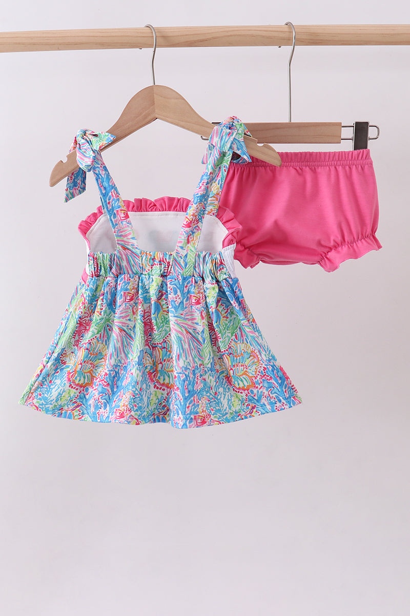 Ensemble barboteuse à smocks et volants, personnage rose