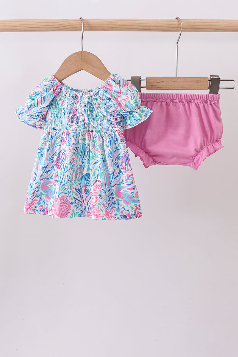 Ensemble barboteuse à smocks et volants bleu marine