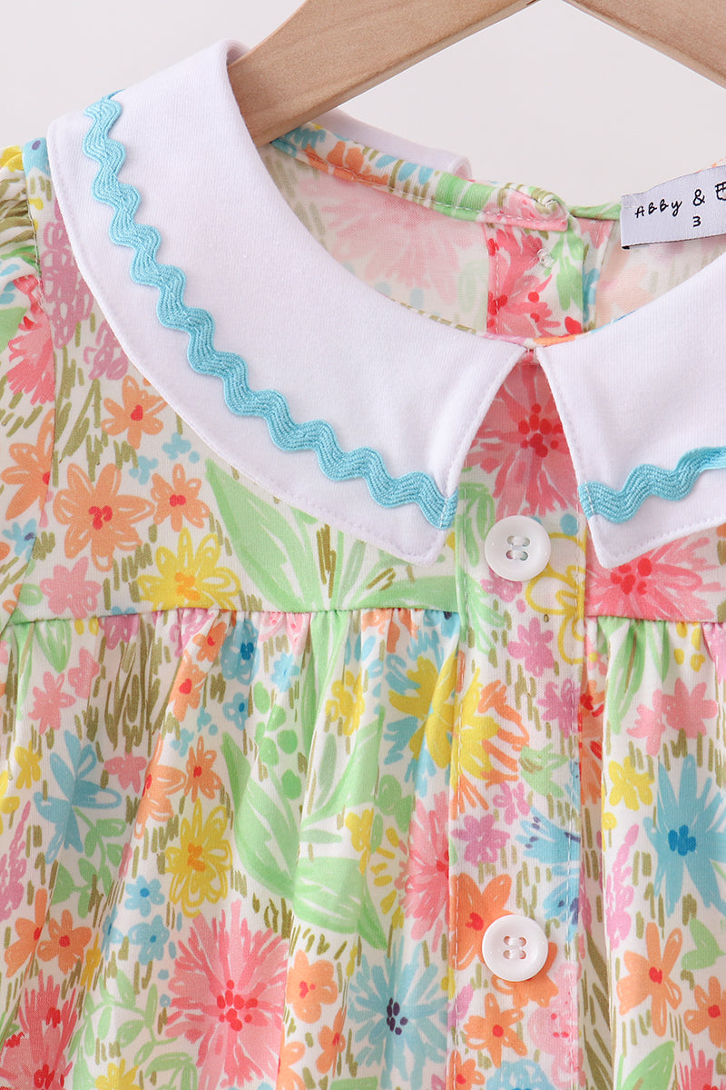 Robe à volants rose à manches bouffantes et imprimé floral