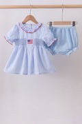 Ensemble barboteuse à smocks et volants, drapeau bleu