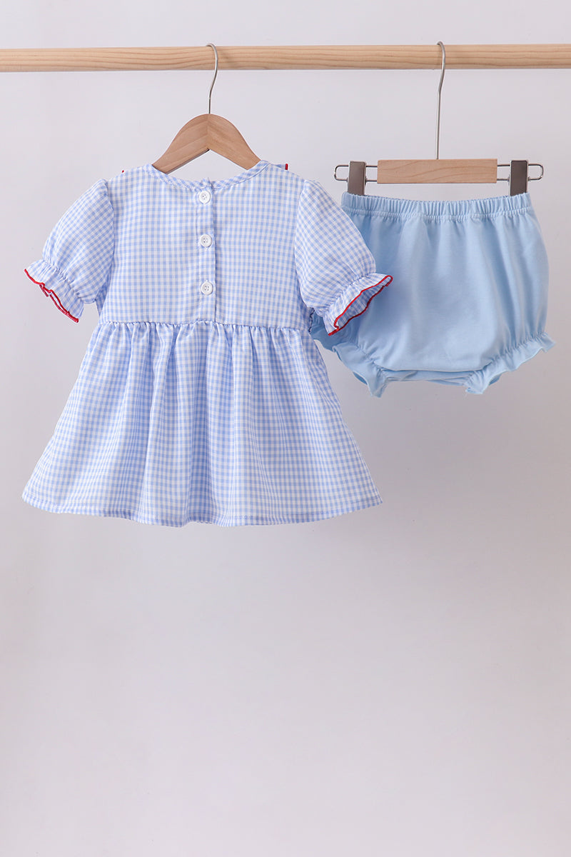 Ensemble barboteuse à smocks et volants, drapeau bleu