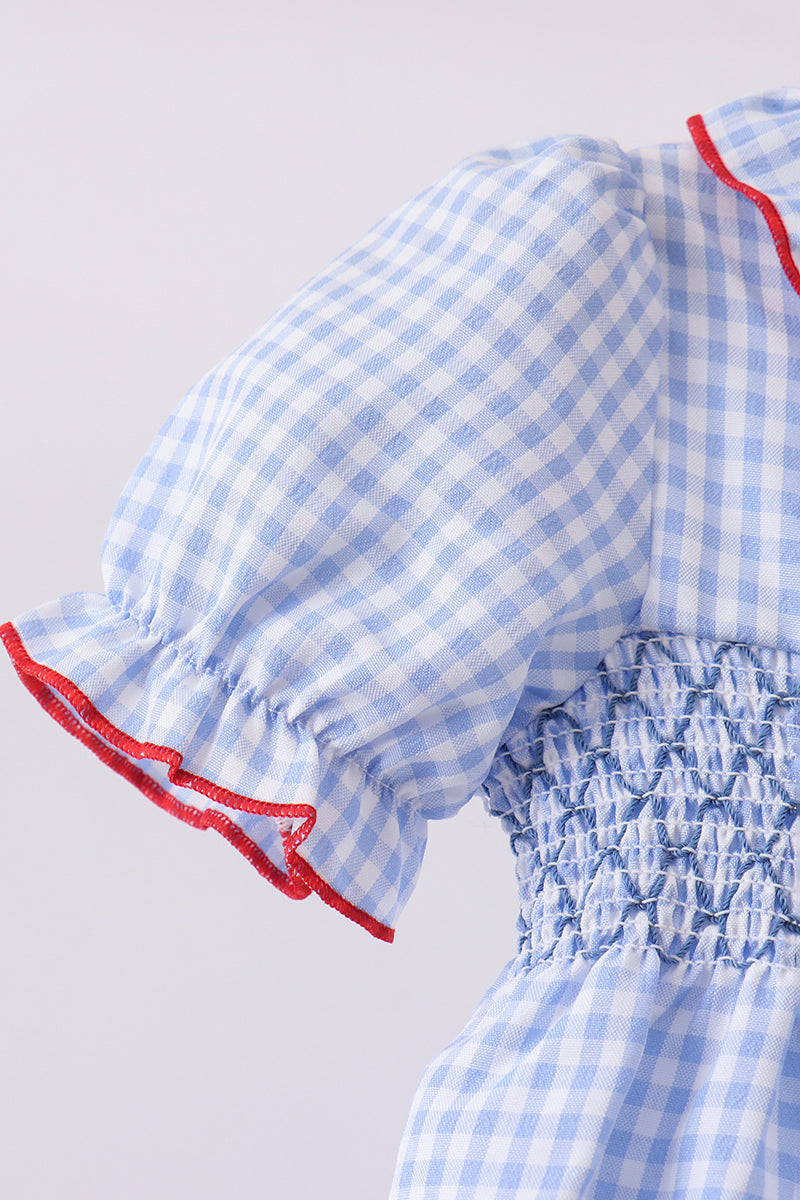 Ensemble barboteuse à smocks et volants, drapeau bleu