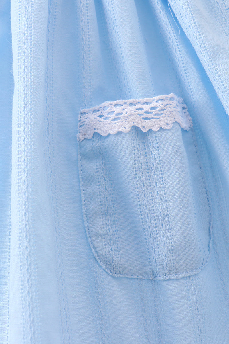 Robe à volant smockée en jacquard bleu drapeau