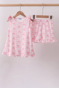 Ensemble short à volants festonnés et imprimé nœud rose