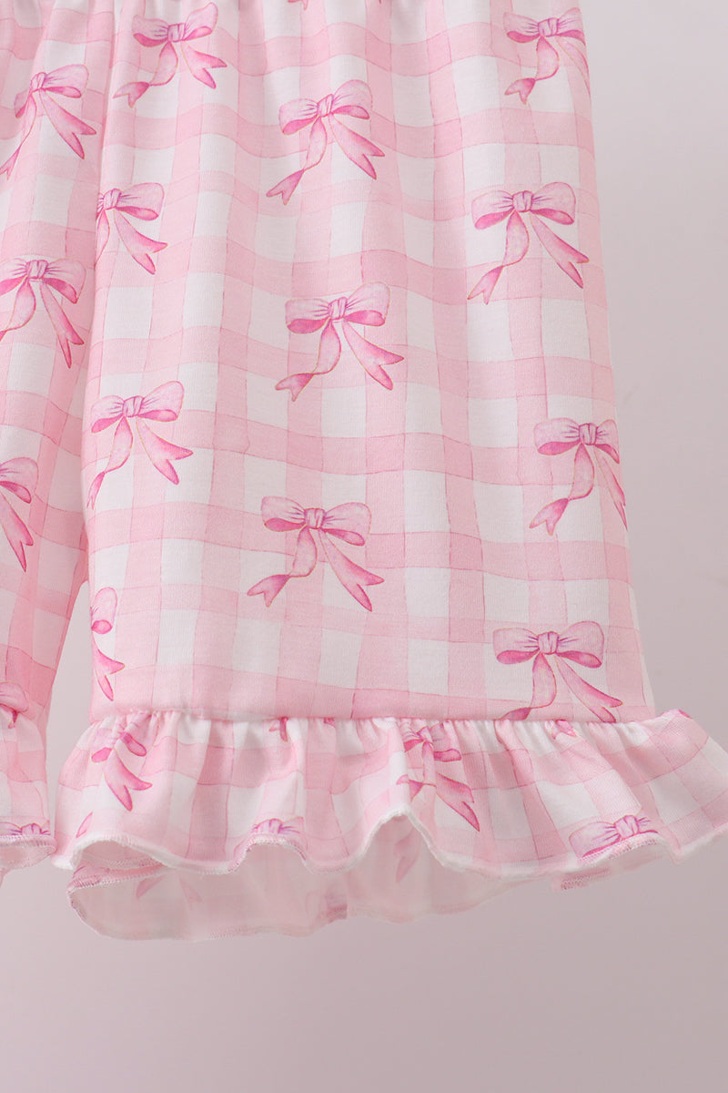 Ensemble short à volants festonnés et imprimé nœud rose