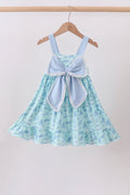 Robe à volants et nœud imprimé plage bleue