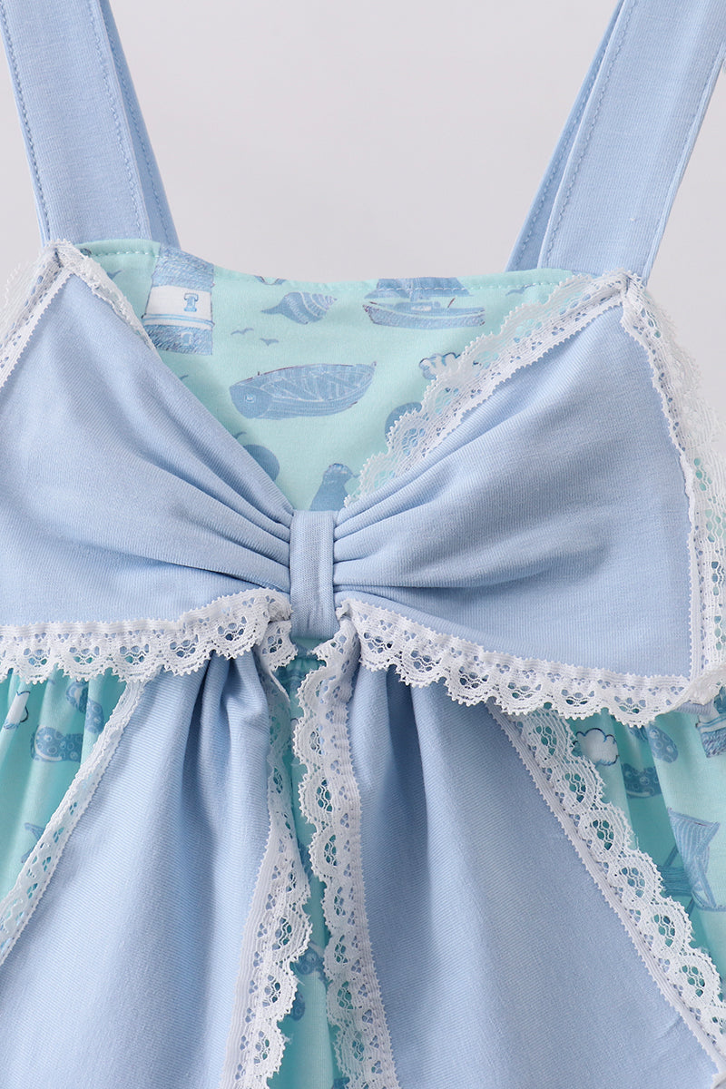 Robe à volants et nœud imprimé plage bleue