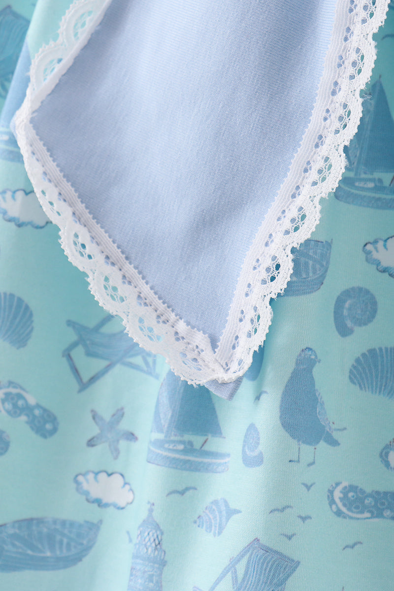 Robe à volants et nœud imprimé plage bleue