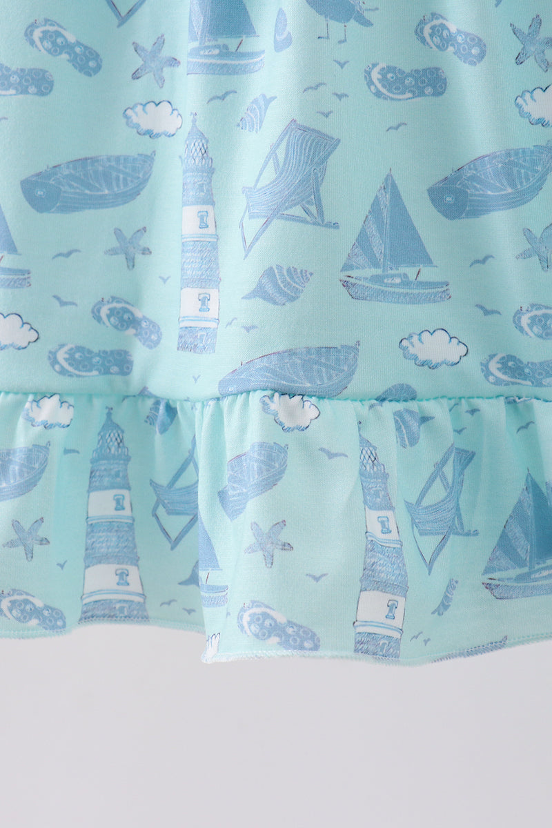 Robe à volants et nœud imprimé plage bleue