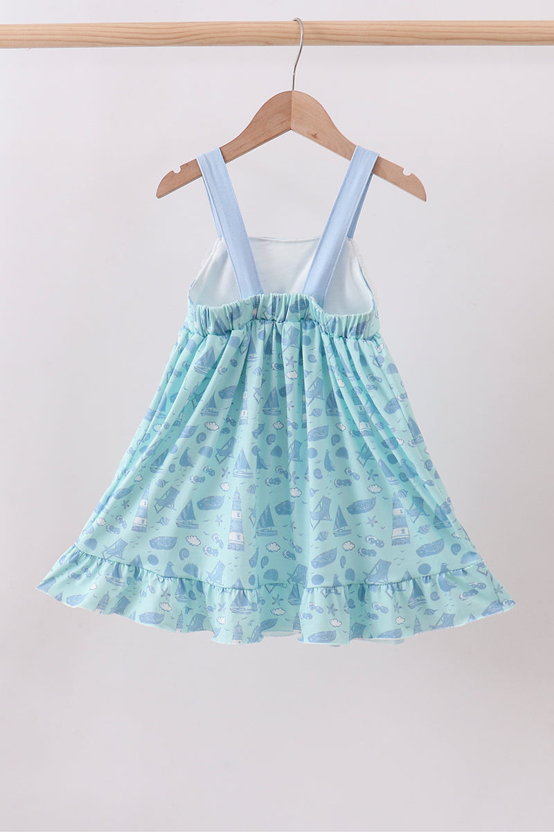 Robe à volants et nœud imprimé plage bleue