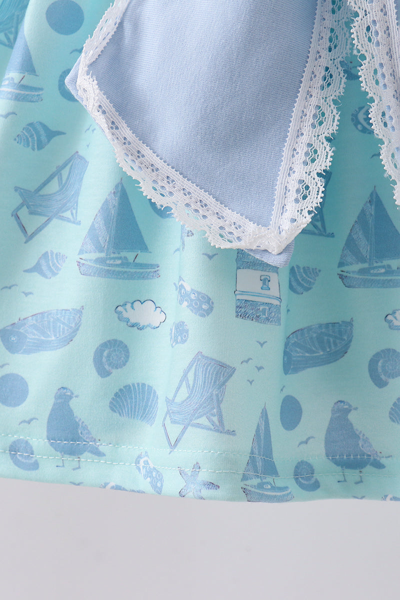 Ensemble short à volants et nœud imprimé plage bleu