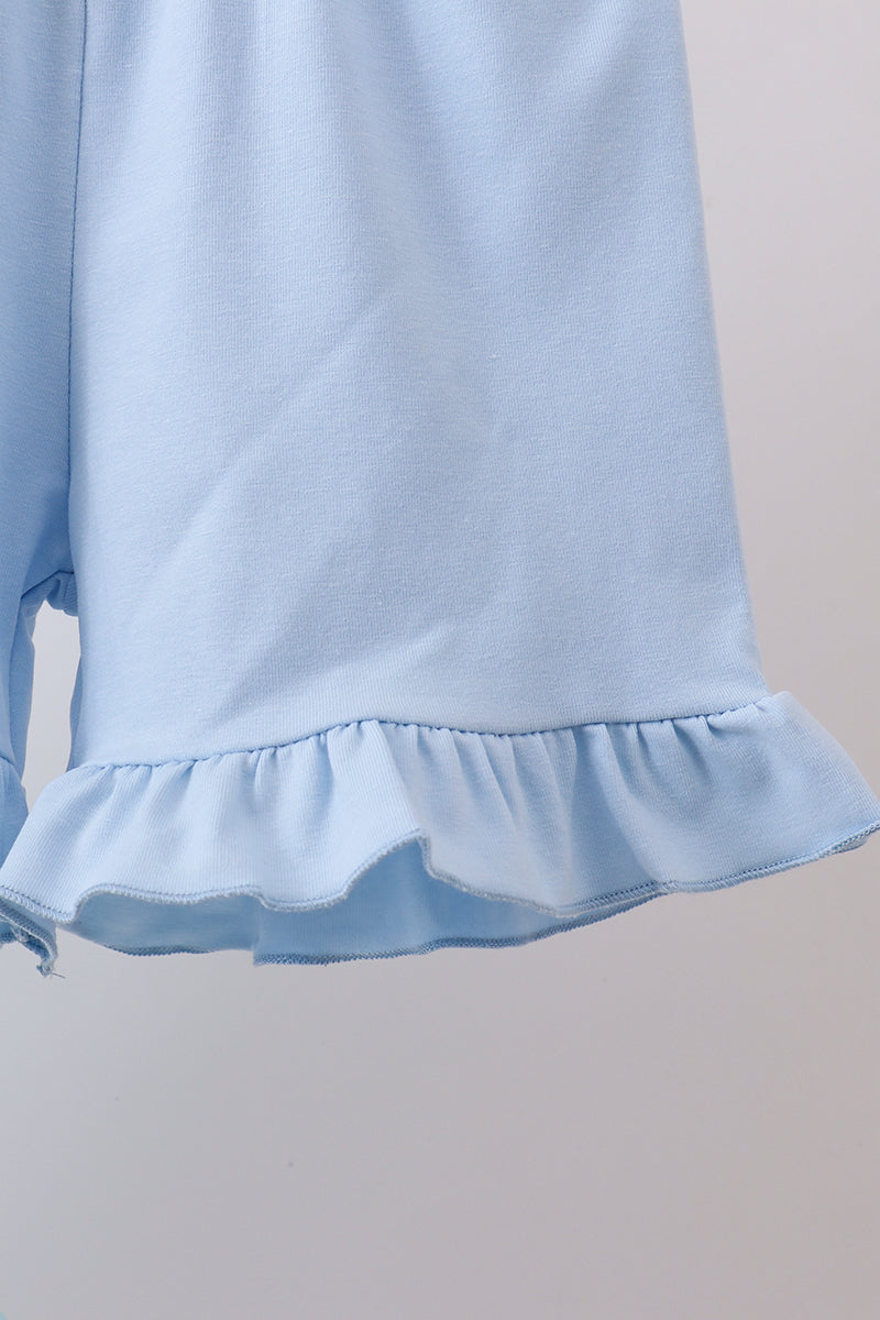Ensemble short à volants et nœud imprimé plage bleu