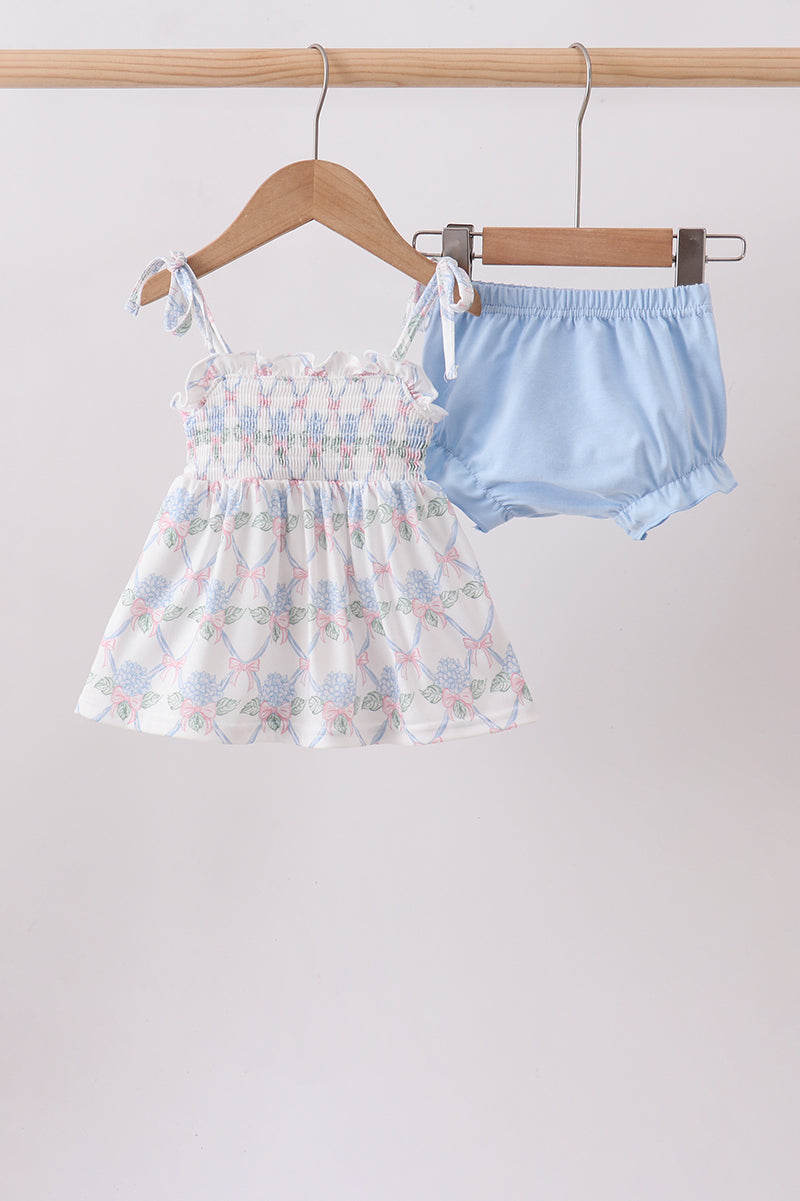 Ensemble cache-couche imprimé floral bleu