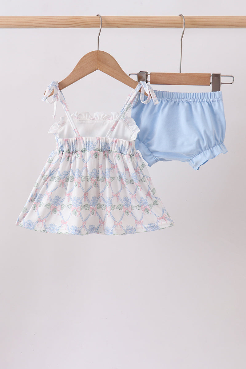 Ensemble cache-couche imprimé floral bleu