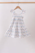 Robe bleue fleurie à volants