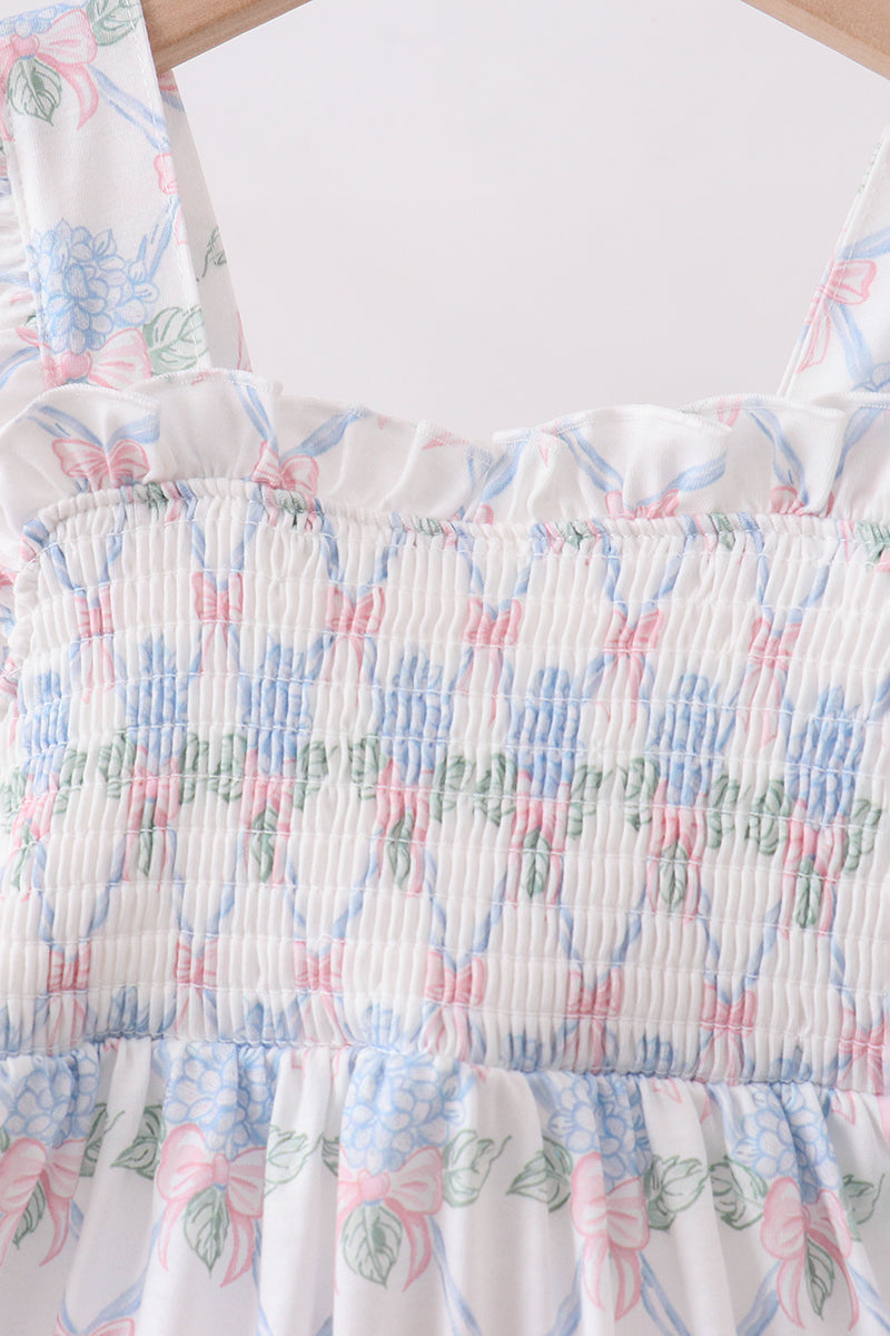 Robe bleue fleurie à volants