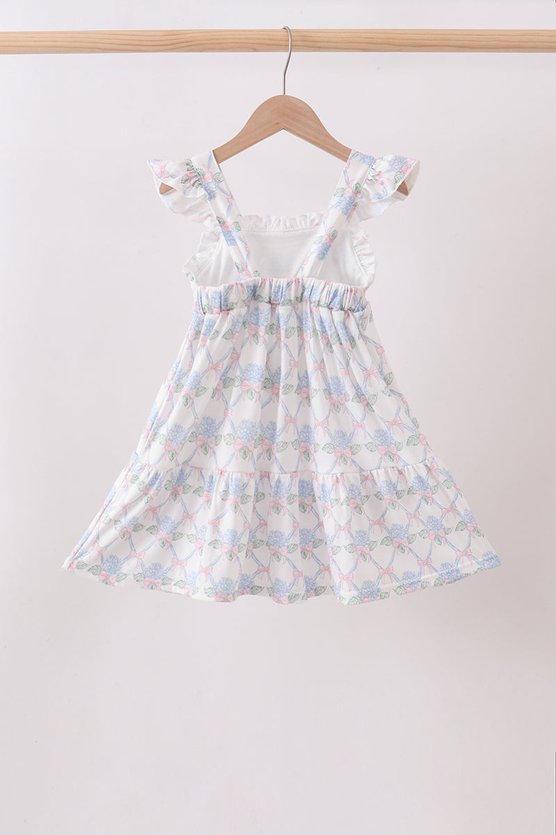 Robe bleue fleurie à volants