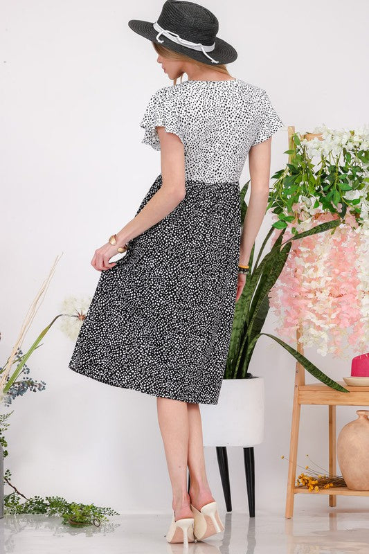 Robe d'été midi sans manches à col rond et fentes latérales pour femme – Un incontournable polyvalent, chic et intemporel avec fentes latérales et sans manches pour un style sans effort