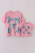 Haut maman-enfant à nœud rose et sequins