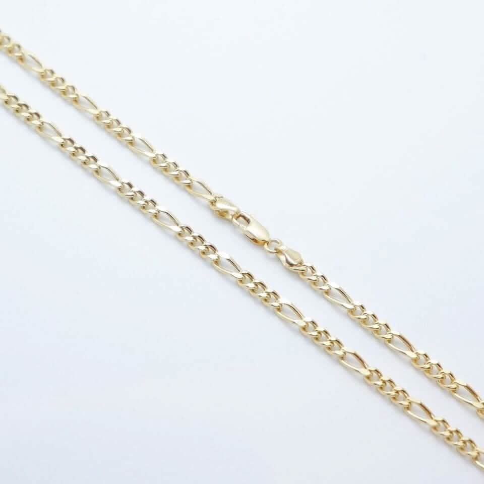 Chaîne en or massif jaune 14 carats maille Figaro 4 mm