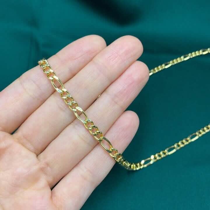 Chaîne en or massif jaune 14 carats maille Figaro 4 mm