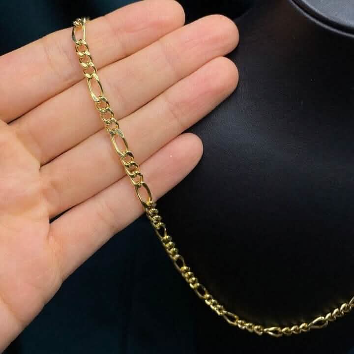 Chaîne en or massif jaune 14 carats maille Figaro 4 mm