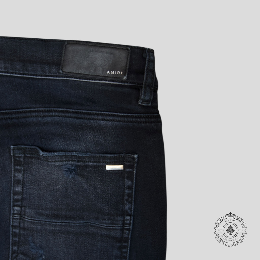Jean Amiri MX1 Thrashed en denim noir vieilli