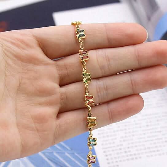 Bracelet de cheville papillon en cristal multicolore en or 18 carats, finition très polie