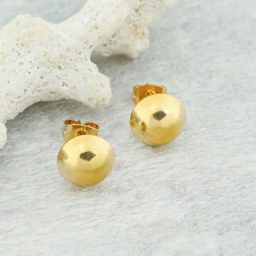 Clous d'oreilles demi-boule en or 18 carats