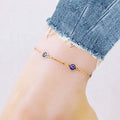 Cheville plaquée or 18 carats avec barre et cristal de l'œil bleu