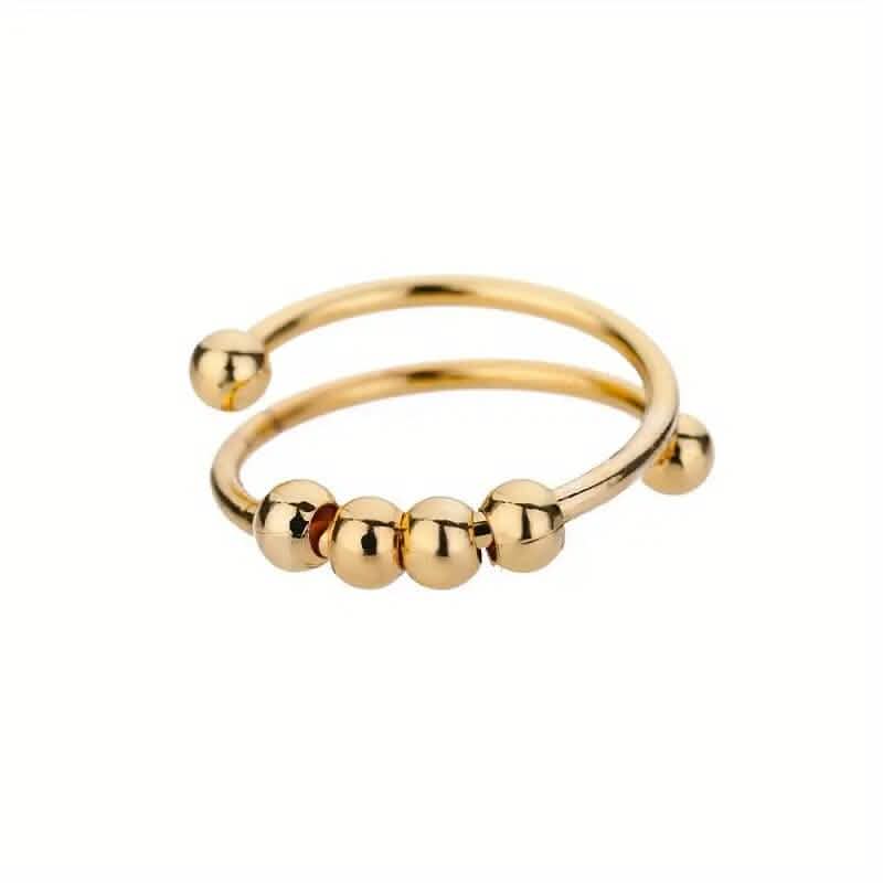 Bague anti-stress en or 18 carats avec perles tournantes