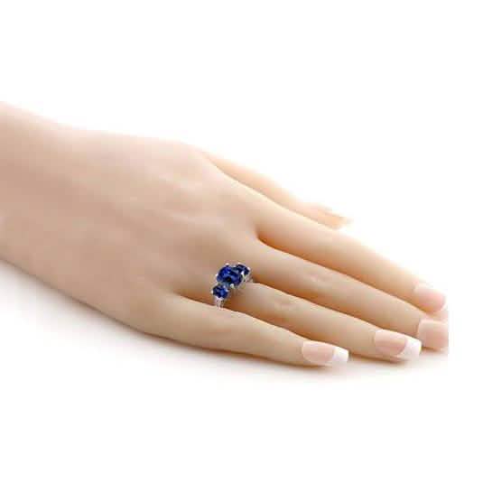 Bague en plaqué or blanc 18 carats avec trois pierres taille ovale