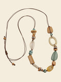 Collier pendentif long perles mélangées bohème