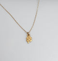 Tiny Gold Shamrock Necklace – Matte Vermeil Charm on 16" Chain