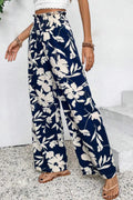 Pantalon ample bleu floral smocké à volants à la taille