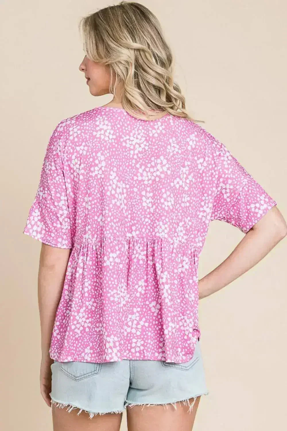 Chemisier péplum fleuri - Top col rond pour femme | Femstylo