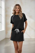 Ensemble femme top manches courtes à cordon de serrage et mini-jupe