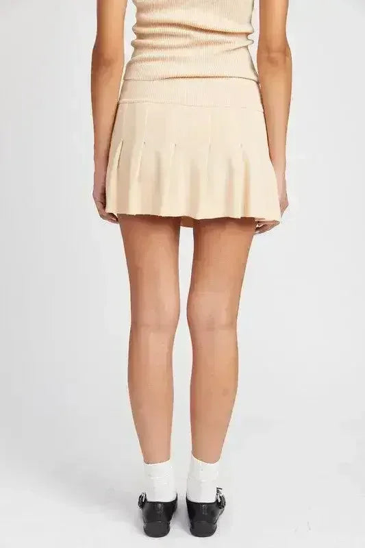 JUPE COURTE PLISSÉE TAILLE BASSE