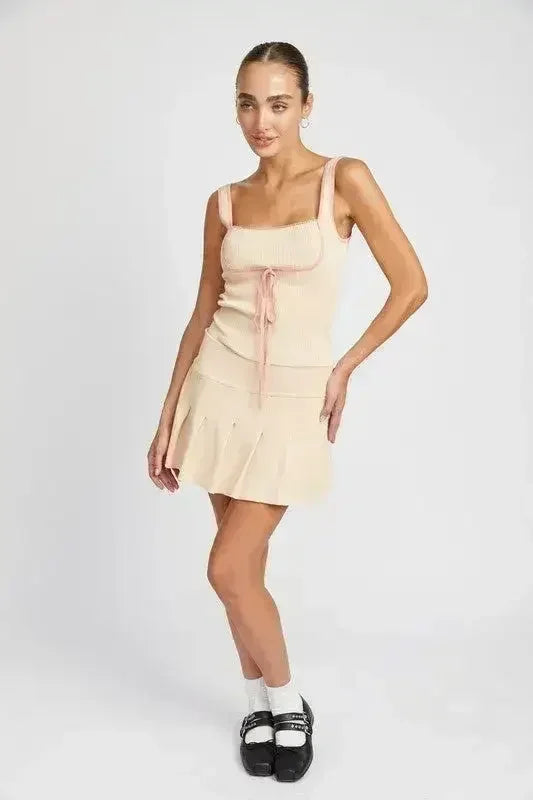 JUPE COURTE PLISSÉE TAILLE BASSE